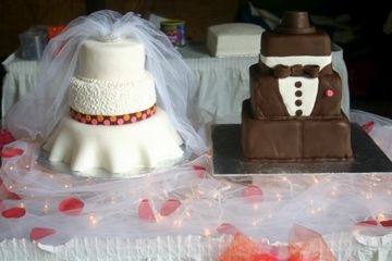 Bride And Groom Both cakes are covered with chocolate fondant.