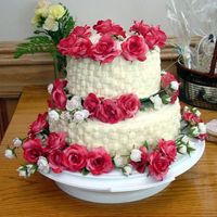 Basketweave With Silk Flowers I made this cake for a friend's wedding shower back in July 2002. The cake was coconut-flavored, with a lime curd filling, and my...