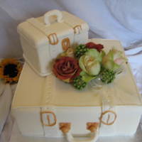 His And Hers suitcase and vanity all fresh flowers