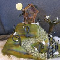 Spooky Shack Airbrushed fondant, gumpaste bats, moon, fence and tree.