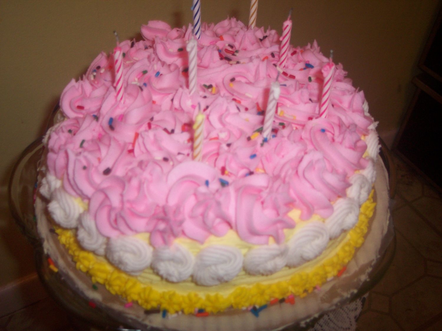 Celebrate With Swirls This cake is pictured in a Wilton book. I gave it a few small modifications.