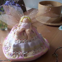 Judy Fairy Heart shaped two tiered lemon and buttercream cakes with modelling paste * Fairy * and flowers,complete with intricate wings with pearl...