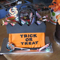 Treat Or Treat Bag Trick or Treat Bag filled with candy. I did these two cakes for the school and church cake walks. Both cakes were covered in marshmellow...