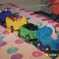 Train Cake Made this for a co-worker. The little boy was so excited with it he didn't want anyone to cut into it.