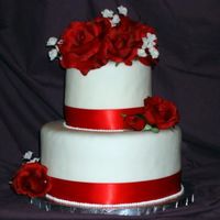 Red Rose 10" inch and 6"round cherry cake with buttercream filling withmmf and silk roses. ribbon trim....someone please give me some tips...