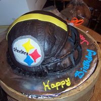Steelers Helmet Birthday Cake For Teen Boy This cake was made for a teen boy on his birthday. He is a big Steelers fan. I used 2 8 inch round wilton pans for bottom and the wilton...