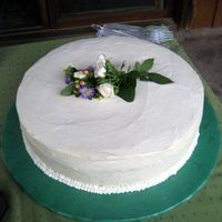 September Wedding--Additional Cake Lemon cake with lemon curd and berry filling, covered with whipped cream cheese frosting. This is a 14" round.