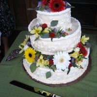 September Wedding This was for my sisters wedding. The cakes are 14, 10, and 6. There was another 14" round as well. The cakes were lemon with lemon...
