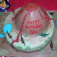 Volcano Cake The volcano is Rice Krispie treats. My first time trying it. All iced in buttercream. The cake was yellow with strawberry filling.