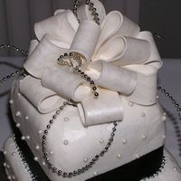 My Very First Gumpaste Bow Well actually the second. The first one ended up being to big for the cake, and this one turned out prettier anyway. I actually had fun...