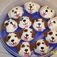 Doggie Cupcakes Made to look like a Jack Russell Terrier and a Golden Lab.