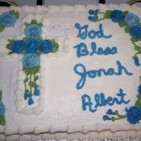 Baptism Cake I need to work on my lettering, and the frosting did not dry in time to be smoother, but I did like my flowers