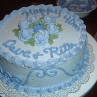 Anniversary Cake I did this cake for a friends parents, I still need to work on my writing.