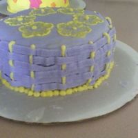 Second View this is a second veiw of the cake i made. purple and yellow buttercream. brush embroidery flowers and basket weaving.