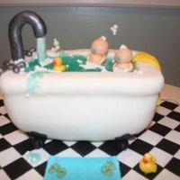 Twins In A Bath Tub I was asked to do a claw foot bathtub with twin boys. Here it its! MMF accents, piping gel for the water.