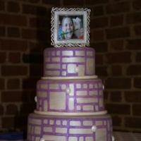 Homage To Linoleum This cake was inspired from the book Cakewalk. the cakes are painted in silver lusterdust and the pattern is painted in lilac. The frame on...