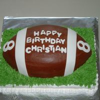 Football1.jpg Football sourcream poundcake with chocolate buttercream frosting, mmf accents. 1/4 sheetcake sourcream poundcake buttercream icing. Thanks...