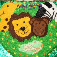 Zoo Pals I made this cake out of a 11x15 square pan. I had to carve the cake to make the shape that I wanted for this cake. The frosting is...