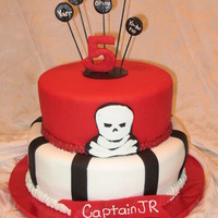 Pirate Cake White cake - one layer with strawberry and one with pineapple filling. They gave me a picture of what they wanted - not sure who did the...