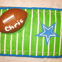 Chris' Cake BD Cake for a Cowboy fan. 1/2 sheet - WASC and strawberry. Football is RKT.
