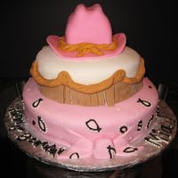 Mia hat has rice krispy treats inside, everything is covered in fondant, design inspired by 2 CC cakes,