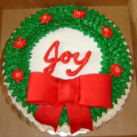 Wreath Better quality. I like this green better than the last one. My flowers are more symmetrical and the bow is a bit neater than the last...