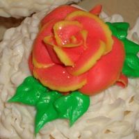 More Roses. I striped the bag for some of them too to create the two-toned effect. The yellow was aligned iwth the narrow end of the tip.