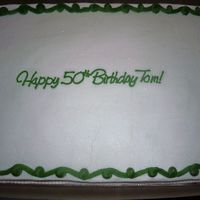 Green Birthday Had no detail for requests on this cake. For our county commissioner's birthday. Spice cake, bc icing. I think it's too plain......