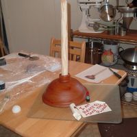 Plunger Cake Look what I just finished (haven't even cleaned up the mess yet)! This cake is for a couple who have been together for 6 years. He has...