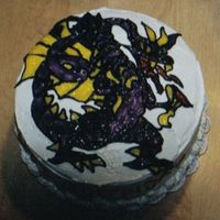 Dragon Cake Vanilla buttercream checkerboard inside. The pattern for the dragon is actually a window art design. I traced the pattern in black royal...