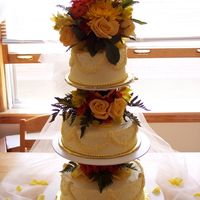 Fall Wedding Made for a small backyard reception. Yellow buttercream, with fresh fall flowers. Thanks for looking.