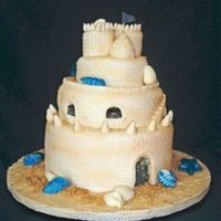 Sand Castle Made of Fondant. White choc. shells, Airbrushed to look sandy.