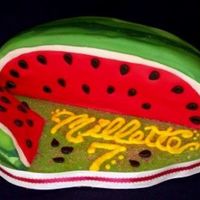 Watermelon Cake Redvelvet cake with fondant covering. The seeds were fondant/gumtext.