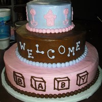 Three Tiered Baby Shower Cake Three tiered baby shower cake. All buttercream. The colors didn't come out right in the picture as the top tier is actually lavender....