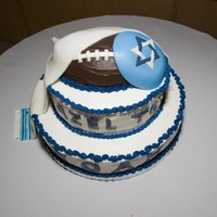 My Younger Son's Bar Mitzvah Cake Strawberry cake w/Banana Filling, Banana cake w/Strawberry Filling, and a Chocolate Football on Top