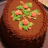 Chocolate Basketweave My first attempt at all chocolate basketweave w/sweet pea flowers on top.