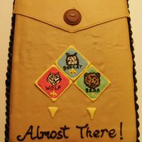 Cub Scout Uniform Cake This cake was made for a Cake Raffle by our local Cub Scout Pack. It depicts three of the four badges of rank as you progress through the...
