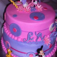 Minnie Mouse Cake 2 tiered all buttercream cake with fondant accents