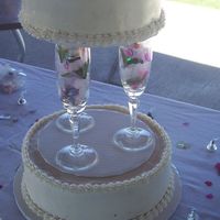 Champagne Glass Bridal Sho chocolate cake with fondant roses... glasses filled with silk roses, confetti, and tulle
