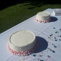 Bottom 2 Layers Of Lily Wedding Cake Red velvet cake, buttercream icing with royal lilies