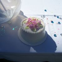 Top Of Lily Cake topper make with matching lilies and fondant roses Tip: red velvet is the hardest cake to work with! it is so delicate that it just starts...