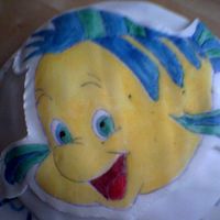 Flounder Cake Made this cake for my boyfriend a couple of years ago. Very simple but i thought it turned out quite well.I used fondant icing and painted...
