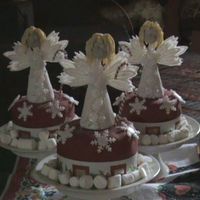 Snowflake Angels I made these miniature cakes for my little boys teachers for christmas. They are slightly bigger than cupcakes and i found these cute...