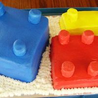Legocake.jpg Chocolate sheet cake cut into different sized to make the legos. I used marshmallows for the little nubs on the cakes and found them very...