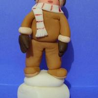 Going To Alaska Request to make a fondant figure of someone who will be moving to Alaska. Also made a simple pipe to go with it to represent the Alaska...