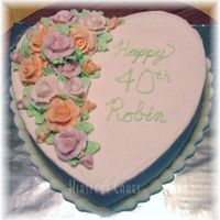 Heart With Roses This cake gave me such a headache, had huge problems making roses and had to make another batch of icing. It turned out great in the end,...