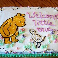 Classic Winnie The Pooh White almond sourcream cake with buttercream and gel decorations.