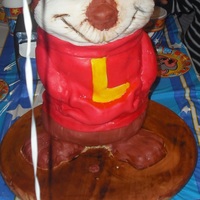 Chipmunk Cake Head to waist is all cake with RKT ears. The waist down is constructed of wood, styrofoam, and RKT. The "L" is for the birthday...