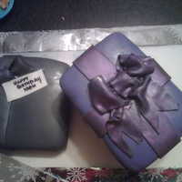 Gift Boxes I made this cake for my Mom's birthday. It is lemon cake, lemon curd filling with buttercream frosting.