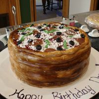 Deep Dish Pizza Cake This is a white cake with chocolate buttercream filling, covered in fondant. The pepperoni was made out of smushed fruit and the cheese is...